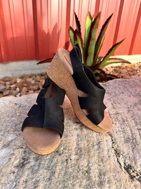 Clark’s black cork wedges